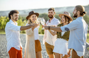 group of people drinking wine